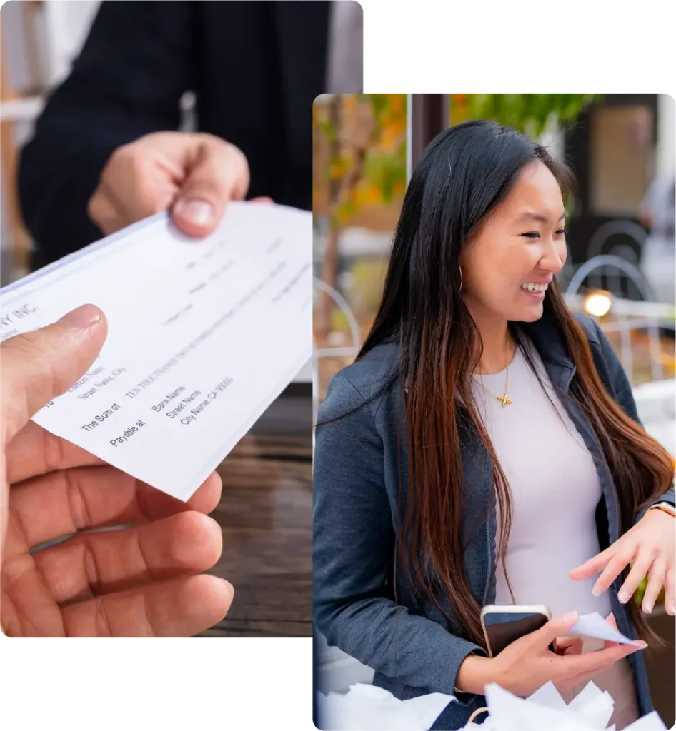 SDA CPA team member smiling alongside a close-up of a payroll cheque being handed over.