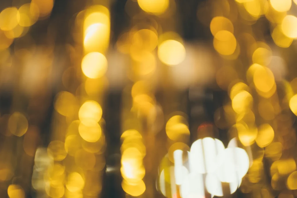 Defocused golden lights creating a warm bokeh background.